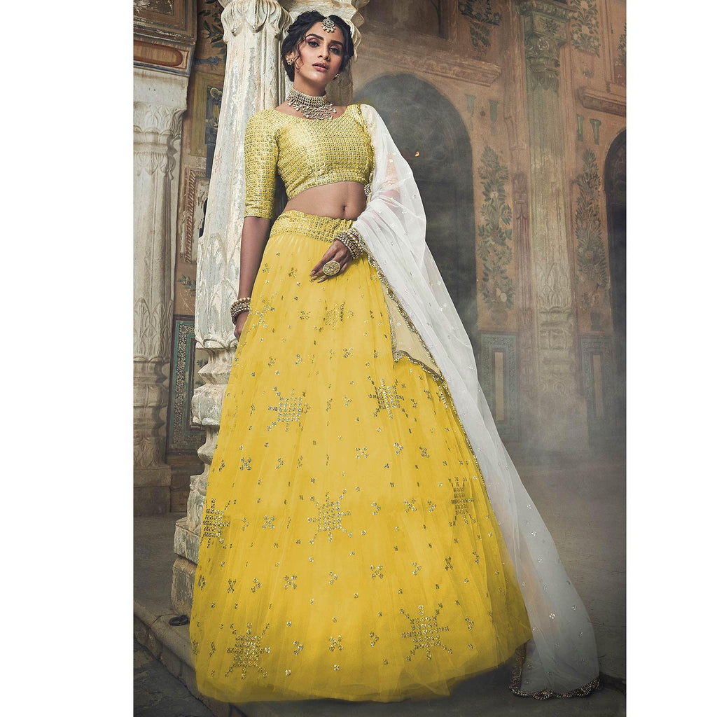 Dazzling Off-White Colored Designer Partywear Embroidered Silk Lehenga