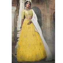 Load image into Gallery viewer, Yellow Sequins Embroidered Net Lehenga Choli Clothsvilla